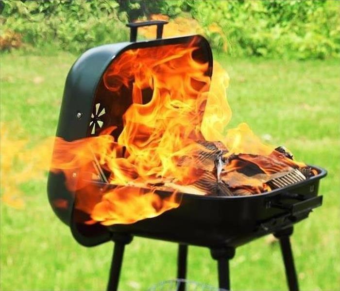 Grill with flames coming out of it