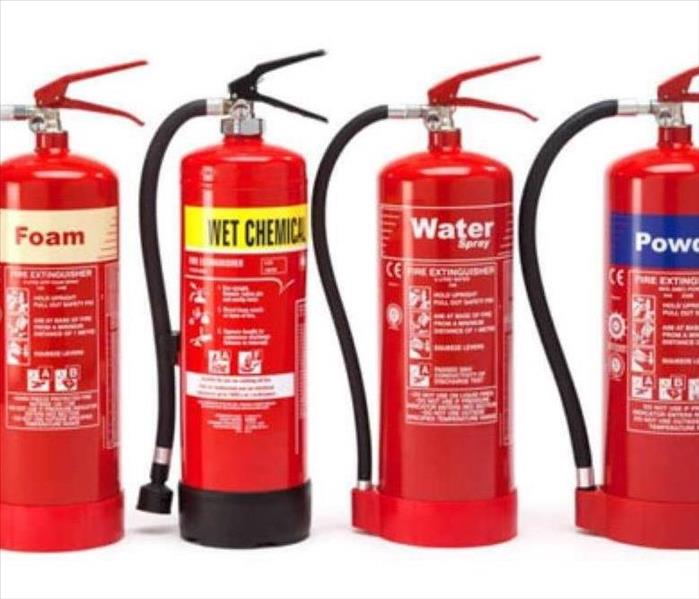 Different fire extinguishers with labels