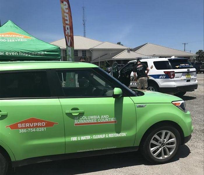 SERVPRO vehicle with local law enforcement